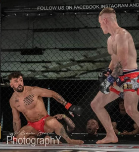 An image of two MMA fighters fighting.